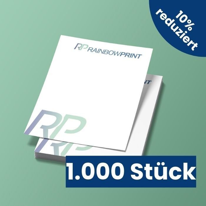 Ein Stapel Flyer DIN A6 von Rainbowprint. Dar�ber der Text 